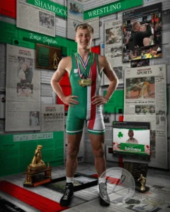 A man in green and white wrestling uniform standing next to a trophy.